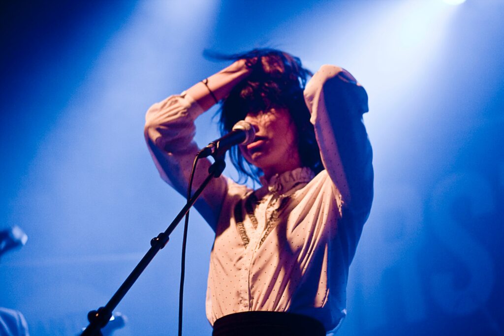 How to break through the noise at SXSW - image of female singer with a microphone